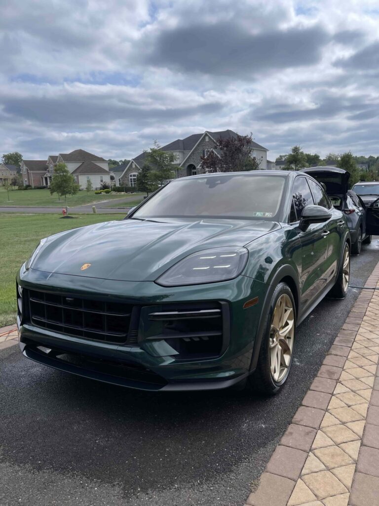 boss auto detail and wash car detailing service complete on exterior of stunning green porsche